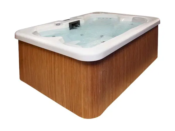 A beautiful hot tub with a sparkling white finish